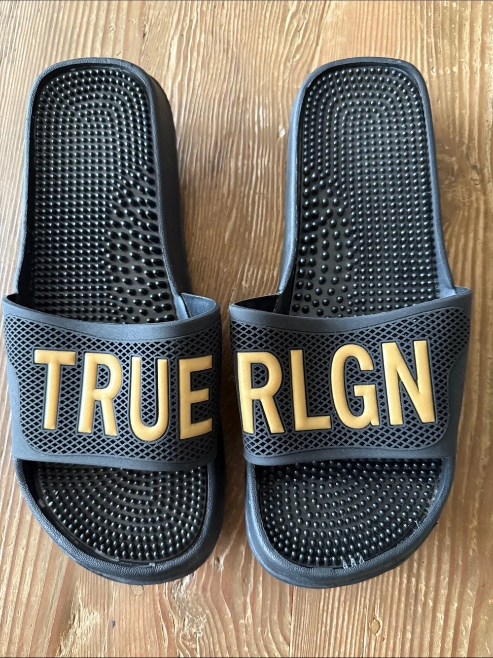 True Religion Black Slides with Gold Lettering